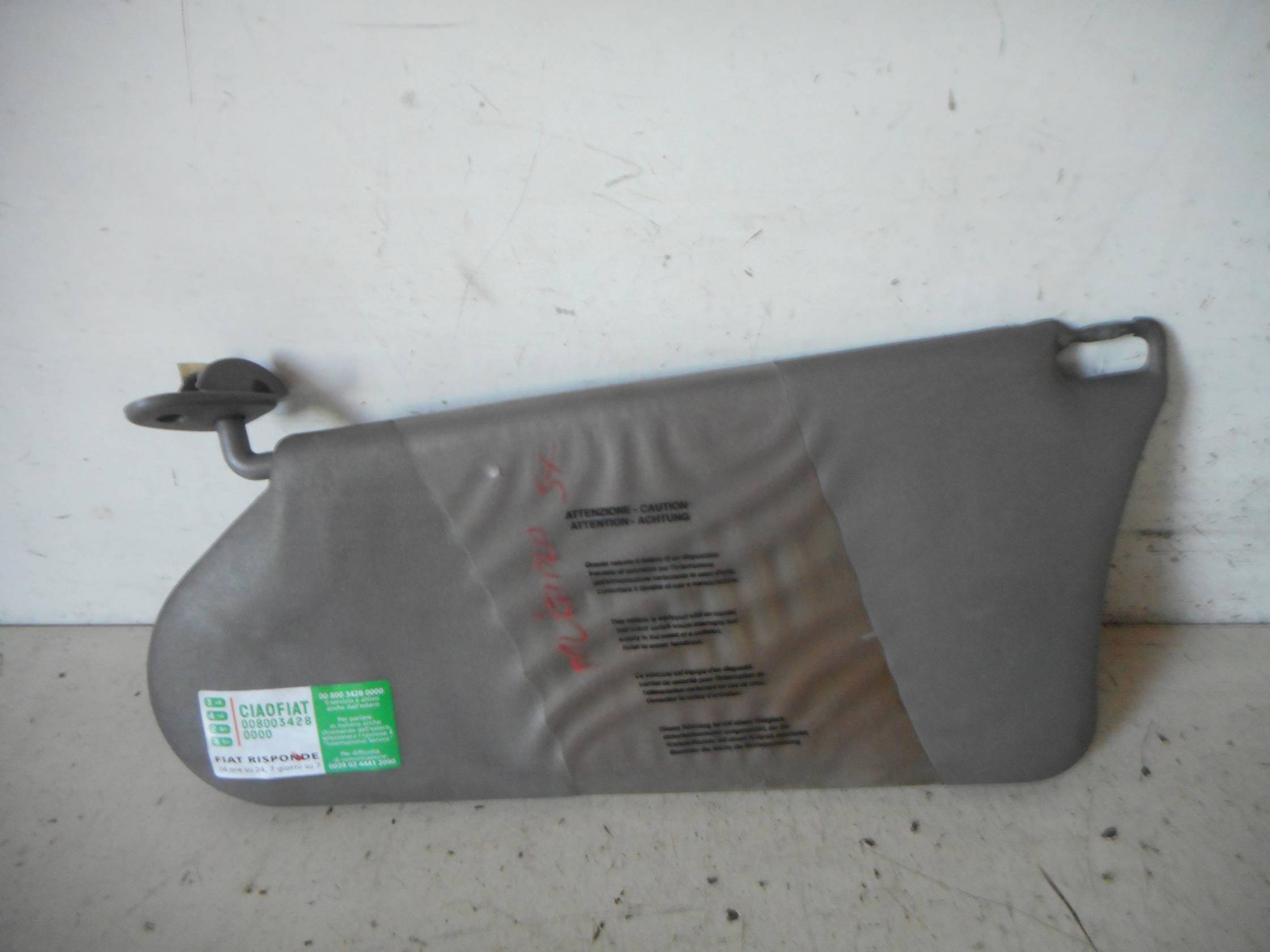 Aletta parasole parabrezza sx.